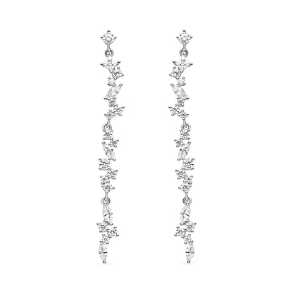 Delicate cascading drop earrings featuring a linear design with shimmering cubic zirconia stones in varying sizes. Lightweight and elegant, these earrings offer a radiant sparkle, perfect for both special occasions and everyday wear.