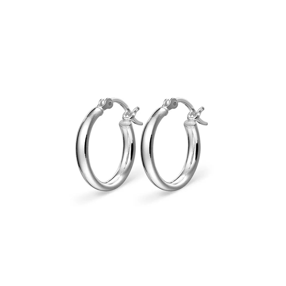 Elegant 18MM round tube hoop earrings in polished sterling silver, showcasing minimalist style and timeless sophistication for any outfit.