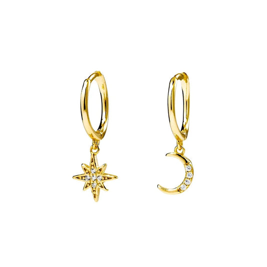 Yellow gold plated huggie earrings featuring celestial charms of a star and crescent moon, adorned with cubic zirconia. Elegant 21x8 mm design.