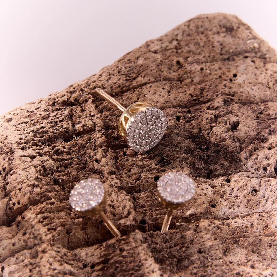 10k yellow gold diamond earrings with a secure screwback design, highlighting intricate craftsmanship and layered diamond patterns.