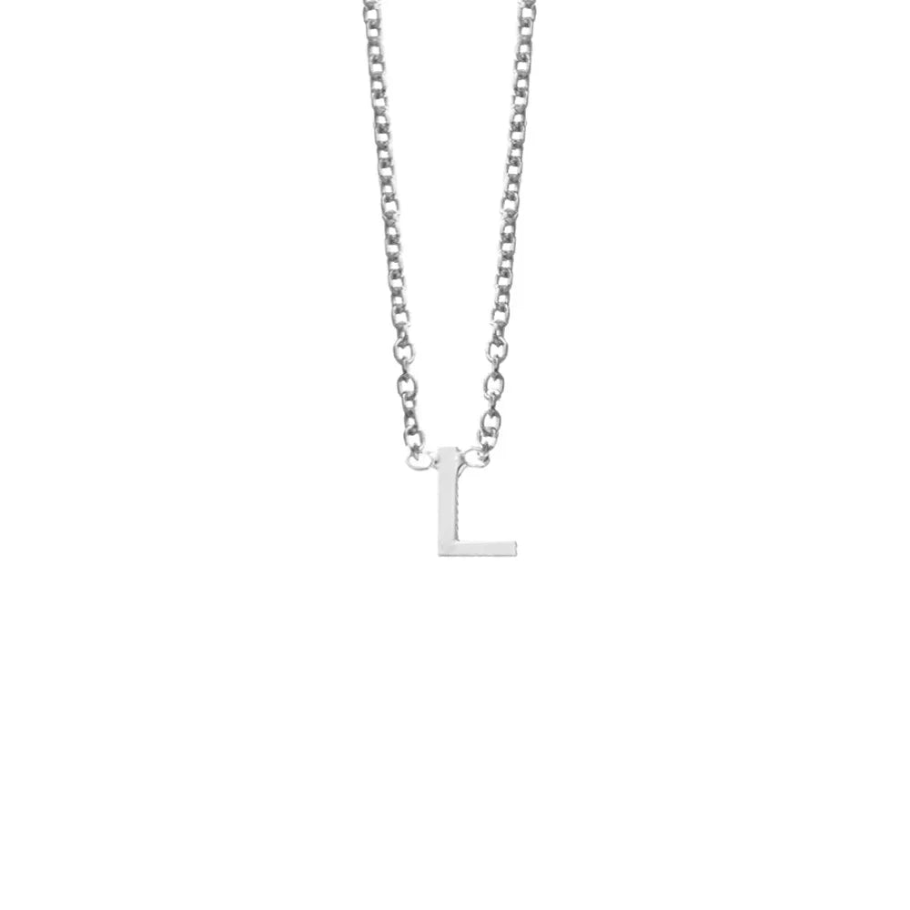 Sterling silver initial "L" necklace on a delicate chain, blending minimalist charm with timeless elegance.