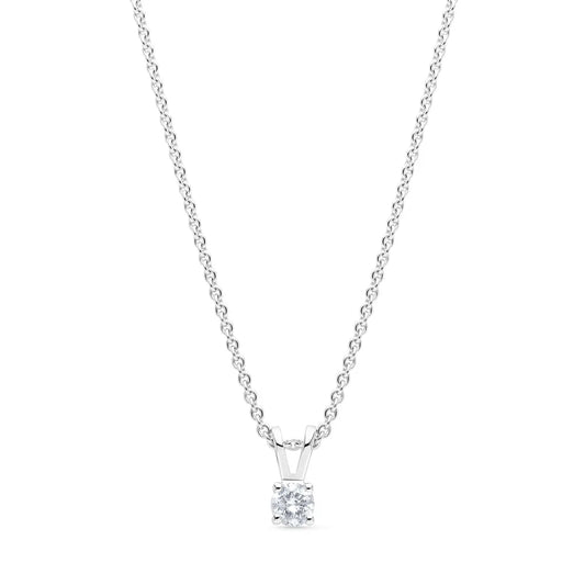 14k white gold solitaire diamond pendant with 0.15 carats, featuring a 4-claw setting and a delicate chain, perfect for timeless elegance.