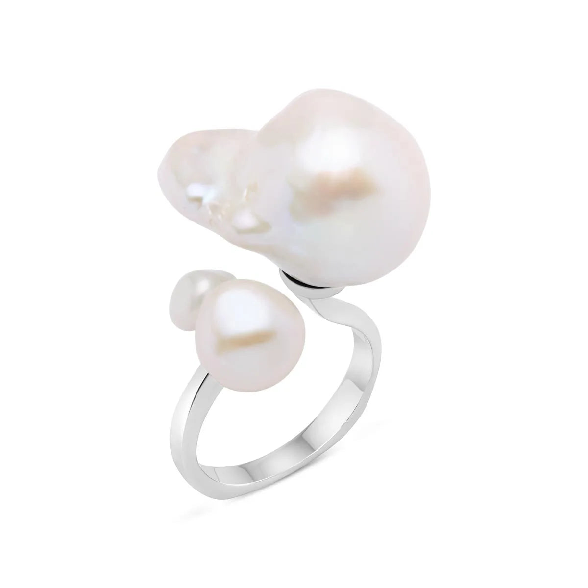 A detailed image of a sterling silver ring with bold, natural freshwater pearls, blending artistry and nature.