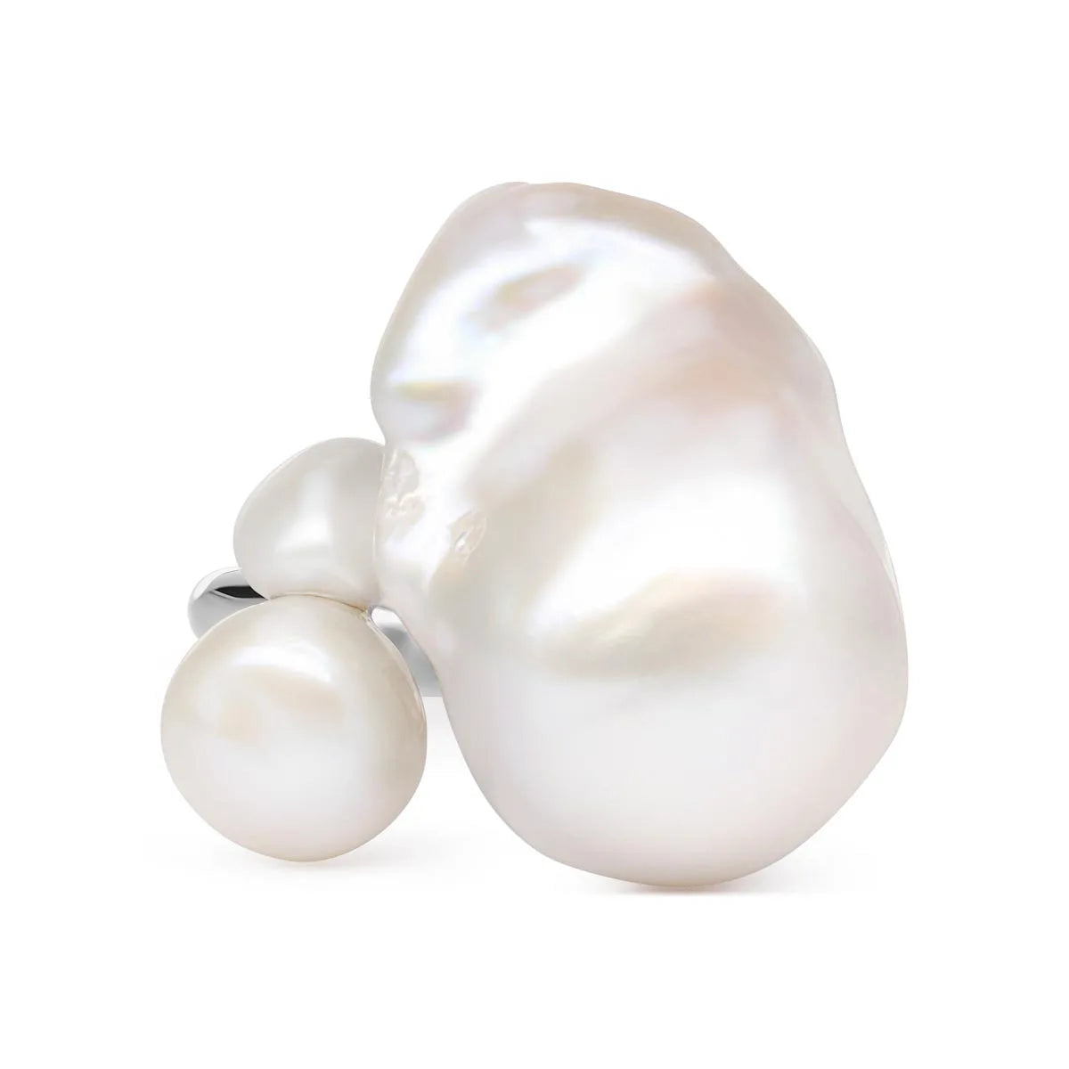 Sterling silver pearl ring featuring three unique freshwater pearls, a standout piece of timeless jewellery.