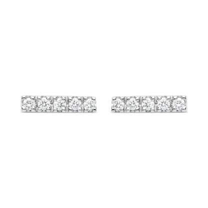 Elegant 18k white gold diamond bar stud earrings with pavé diamonds totalling 0.07 carats, showcasing a modern and luxurious design for timeless appeal.